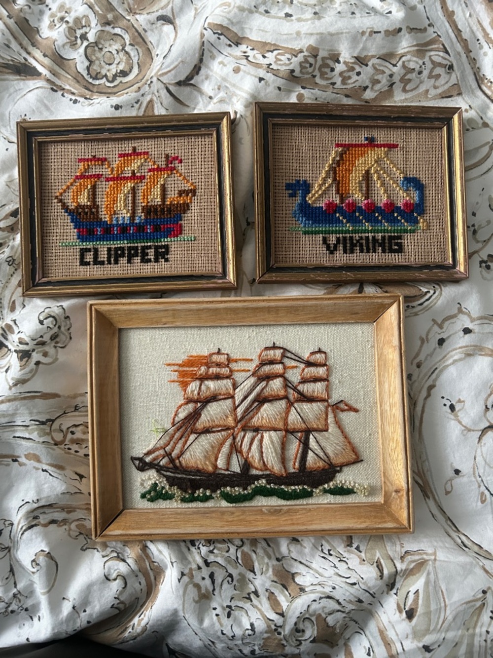 3 small needle point ship pictures NO GLASS 
Lots of flaws